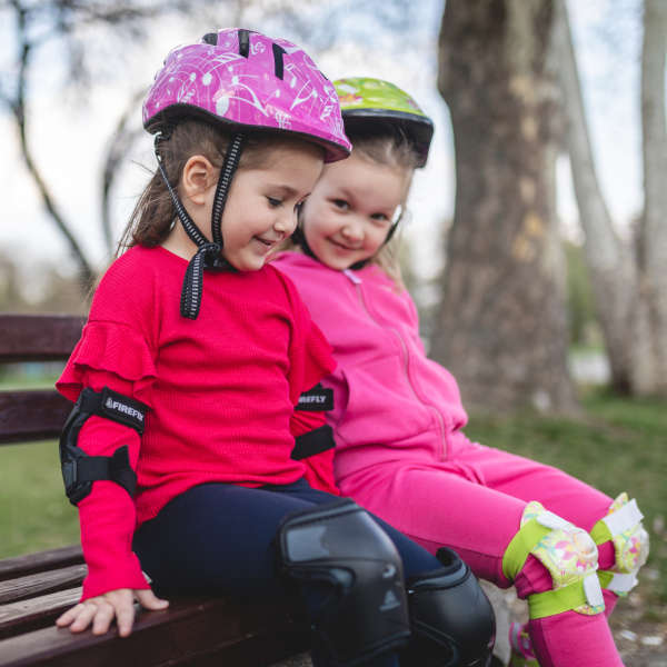Photo of two friends laughing outside