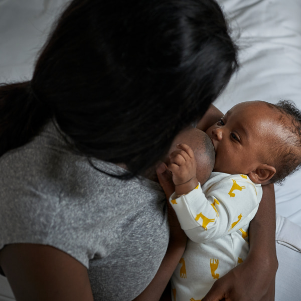 Photo of a mother breast-feeding her baby