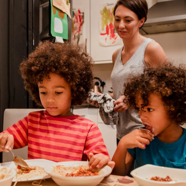 Photo of a family eating together 