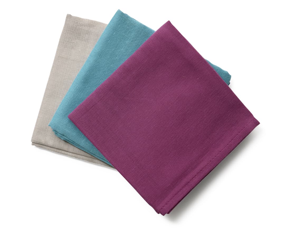 Grey, teal and raspberry muslin cloths from the Baby Box