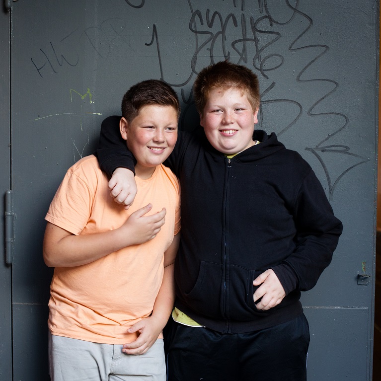 Teen boys smiling